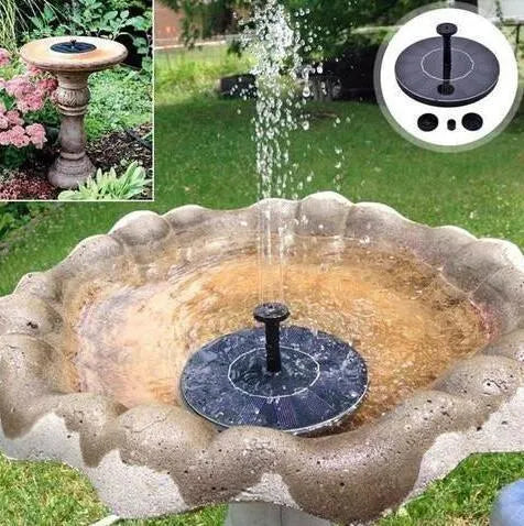 Black solar-powered water fountain pump with four different spray nozzles on a white background