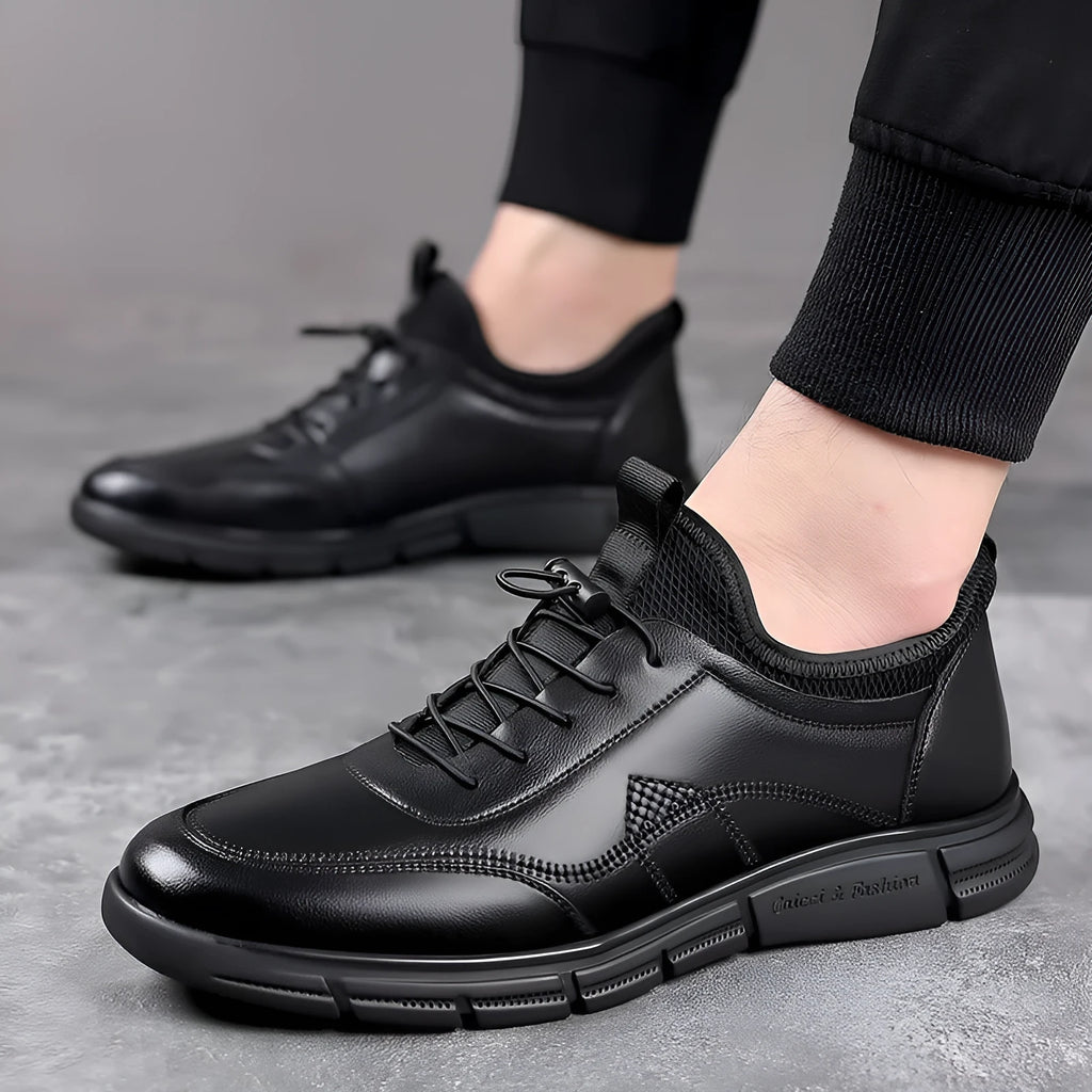 Black men's casual business shoes with round toe and leather stitching details