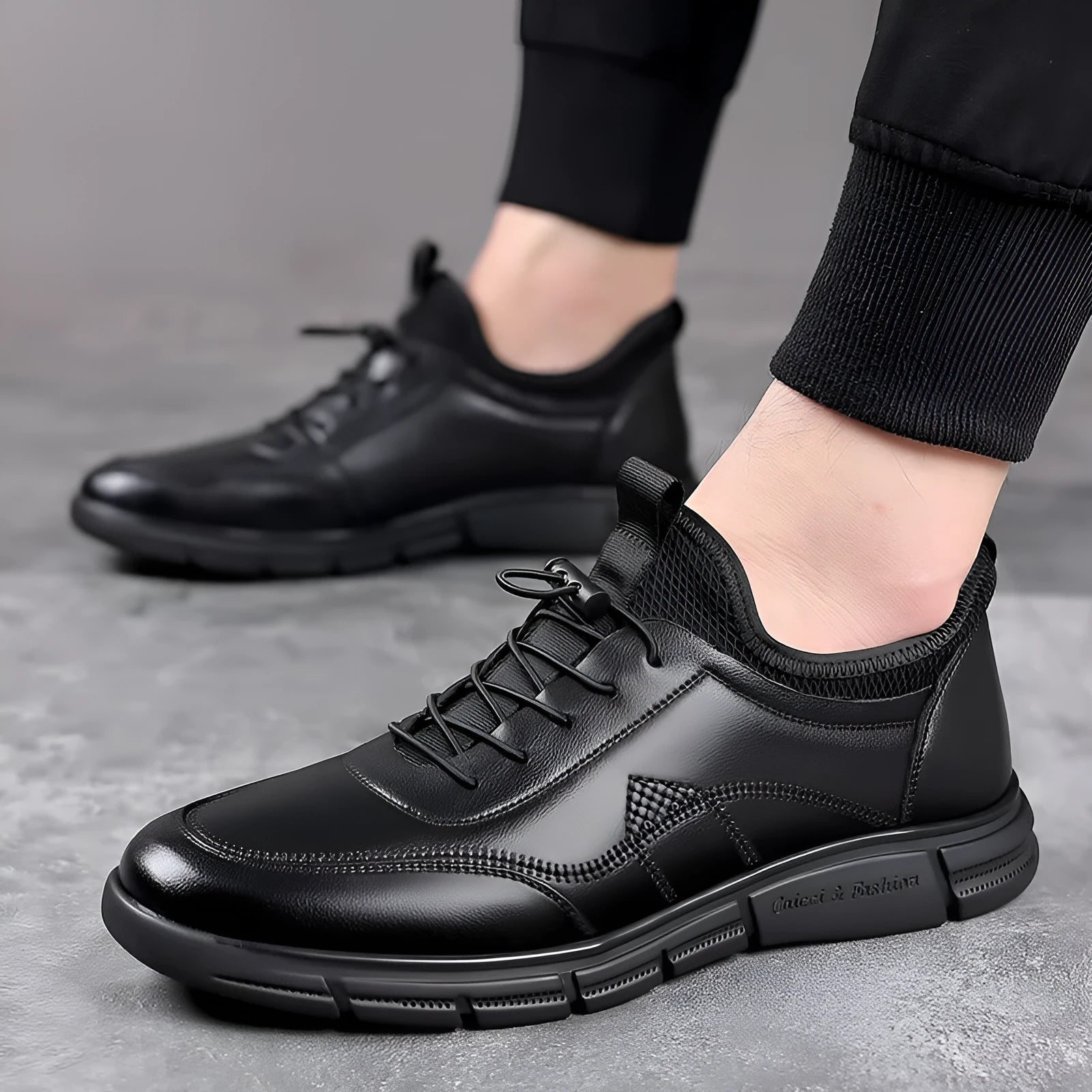 Black men's casual business shoes with round toe and leather stitching details