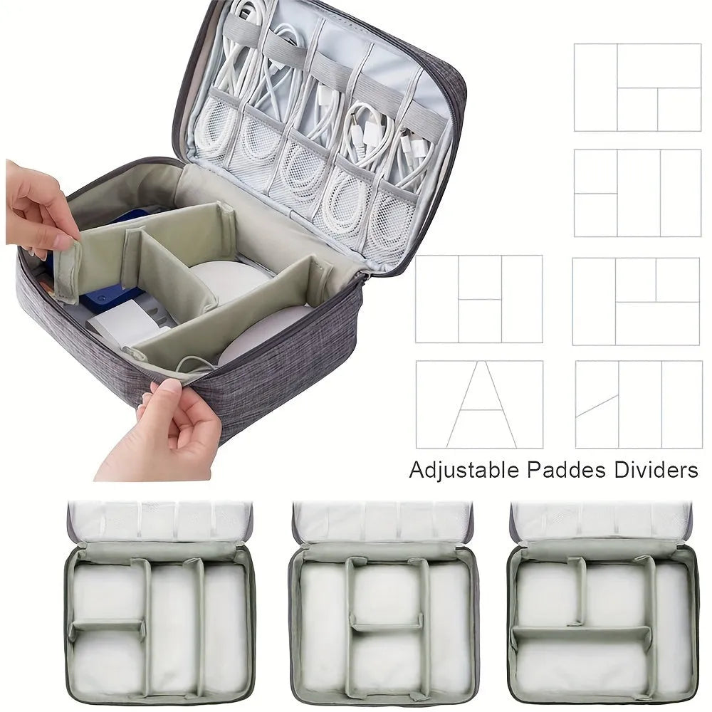 Black electronics organizer travel cable bag with removable dividers, mesh pockets, and a top handle