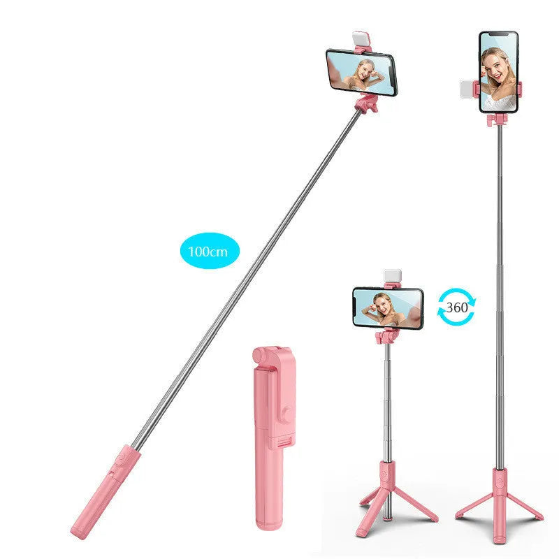 Black Bluetooth selfie stick with integrated tripod and 360-degree rotating phone holder, shown with a remote control.