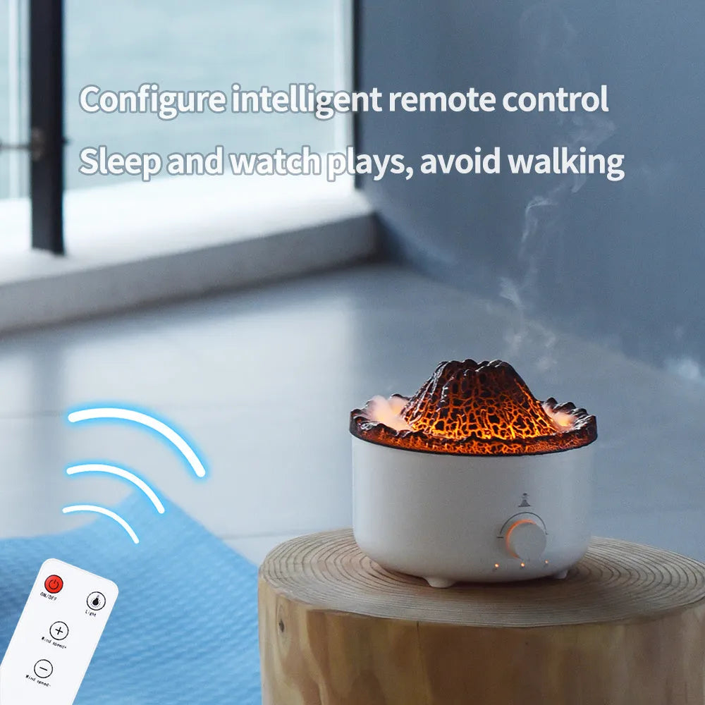 White columnar simulated flame volcano humidifier with remote control on wooden surface