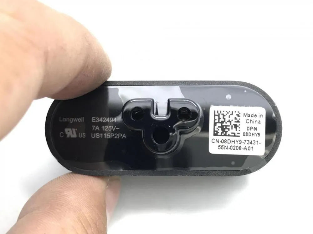 Black folding US plug travel adapter showing plug in both straight and folded positions