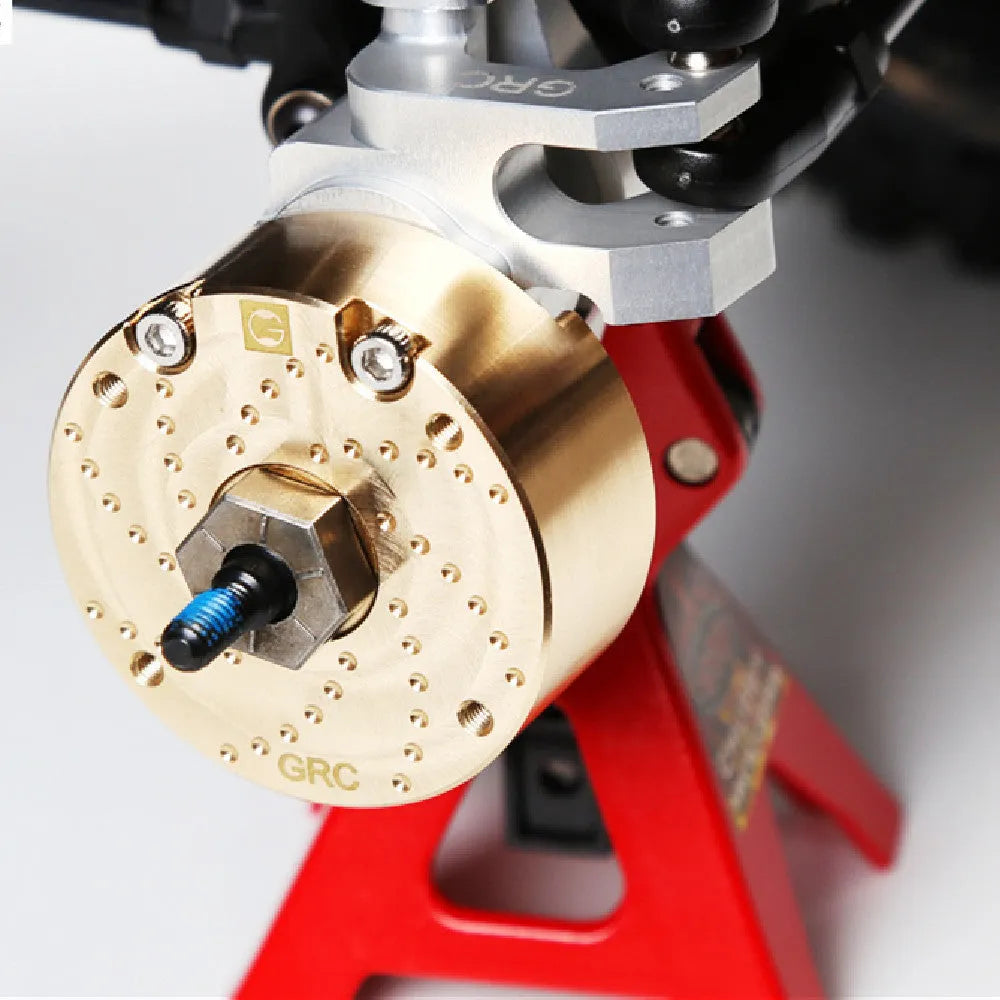 Brass gearbox cover component for toy axle door mechanisms
