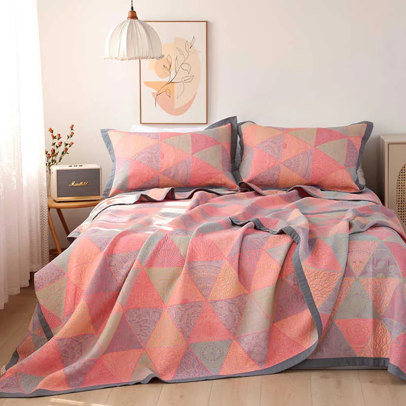 Cotton gauze bed blanket three-piece set with floral pattern showing blanket and two matching pillowcases