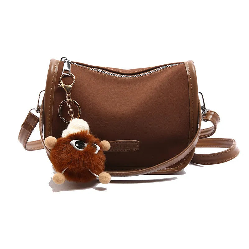 Horizontal square PU messenger bag with leopard print colour option and pendant detail