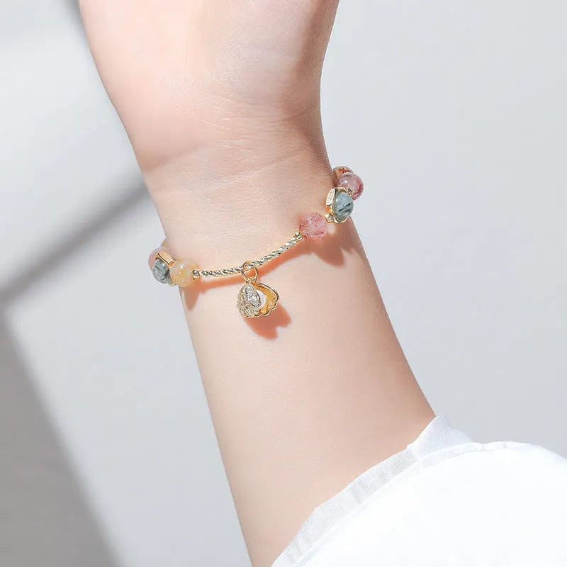 Women's crystal bracelet with coloured hair crystal and red sealant flower shell design