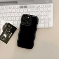 Solid colour air cushion TPU phone case for iPhone 11 to 16 Pro Max in beige, black, or berry red.