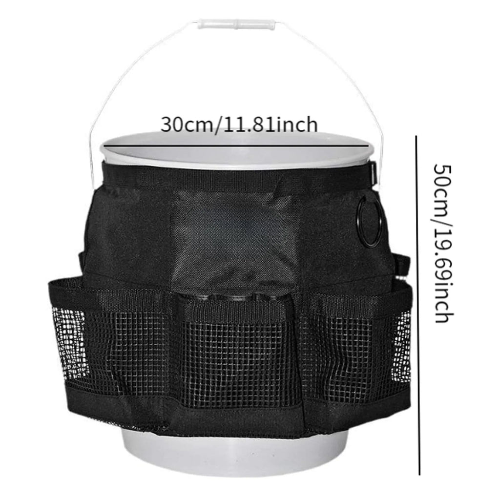 Black cylindrical polyester storage bag with straps hanging from a 5 gallon bucket.
