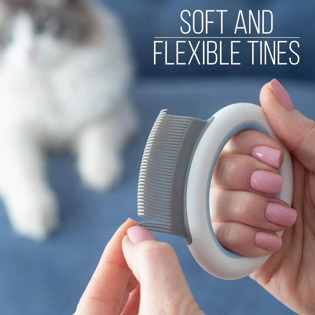 Blue plastic pet grooming comb for deshedding cats and dogs on a white background.