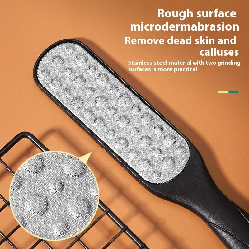 Stainless steel double-sided foot grinder tool with white and black abrasive units for manual foot care.