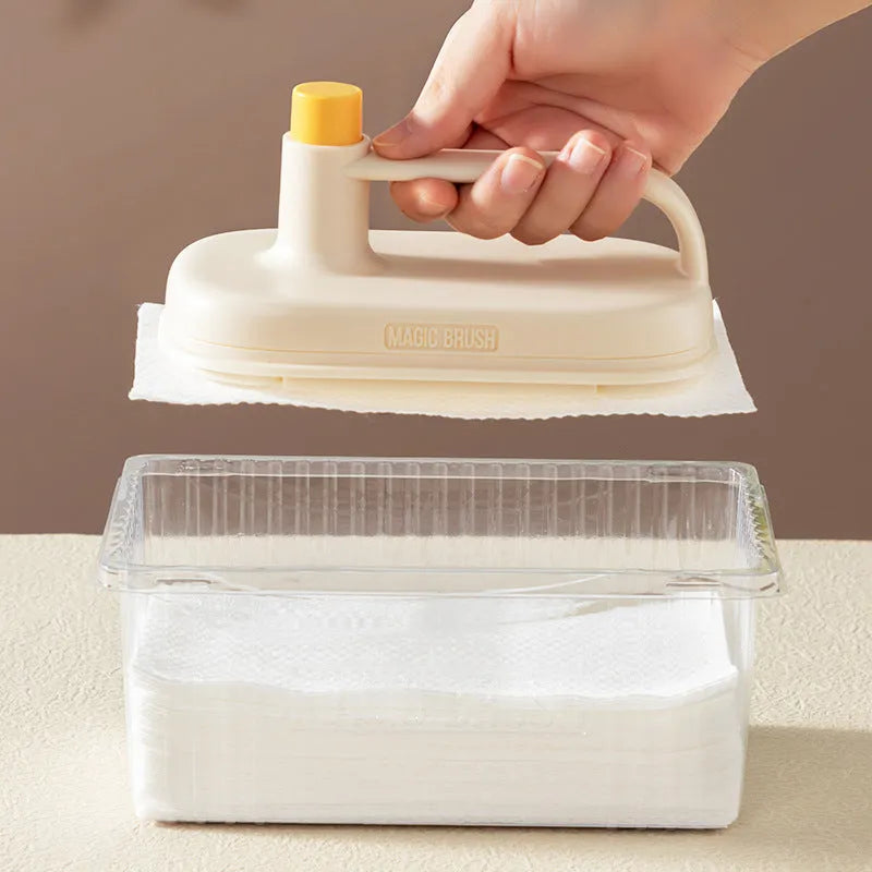 Magic Brush disposable cleaning tool with plastic handle, storage box, and 50 white non-woven fabric rag refills.