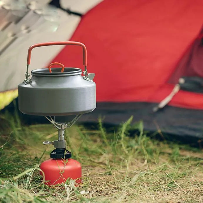 Portable folding mini camping stove made of stainless steel, copper, and aluminium with carry pouch