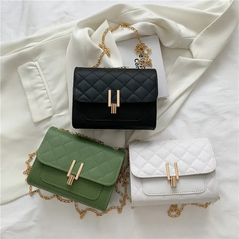 Women's crossbody bag with diamond lattice chain design in PU leather showing black colour option