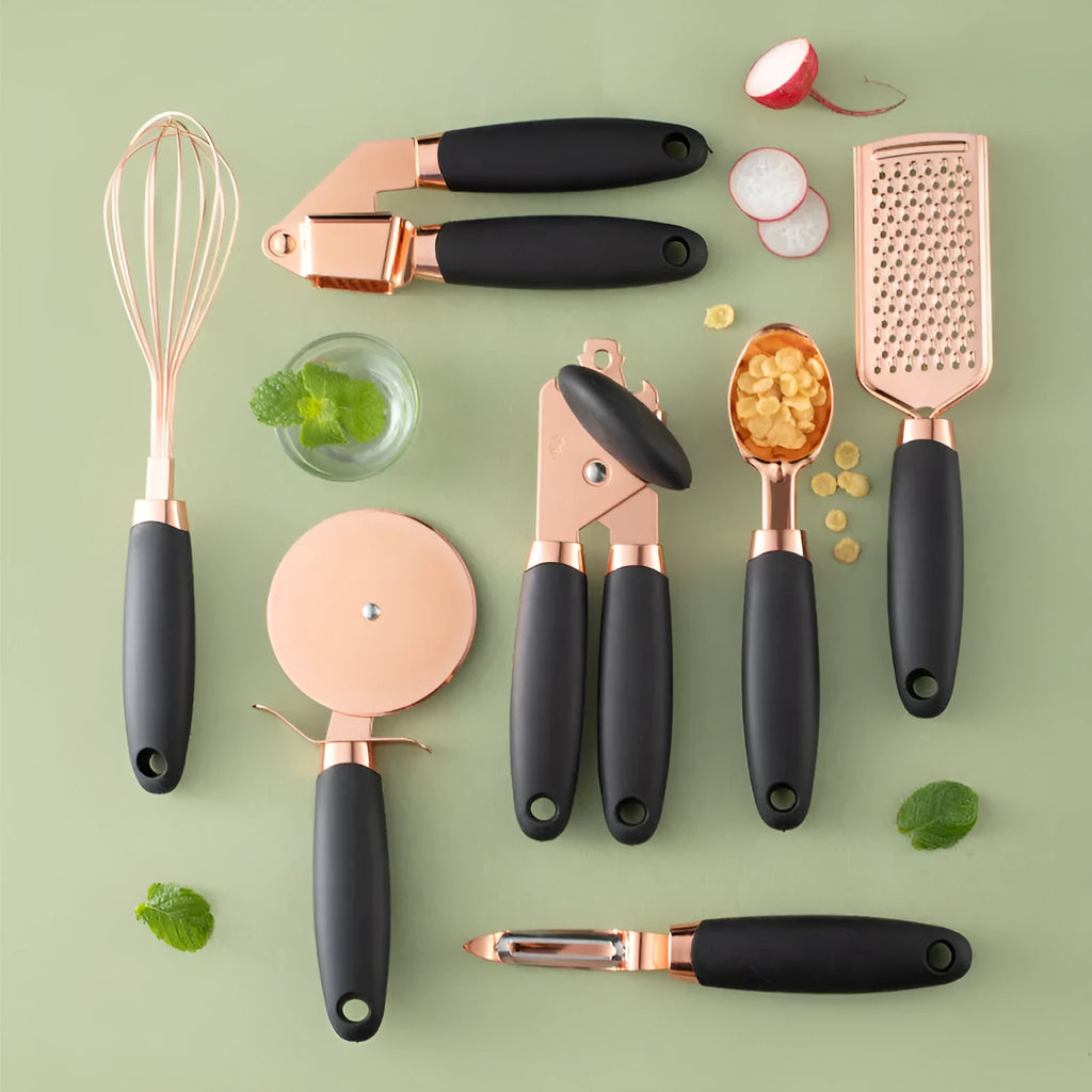 Seven-piece stainless steel kitchen tool set with rose gold finish and copper plating elements