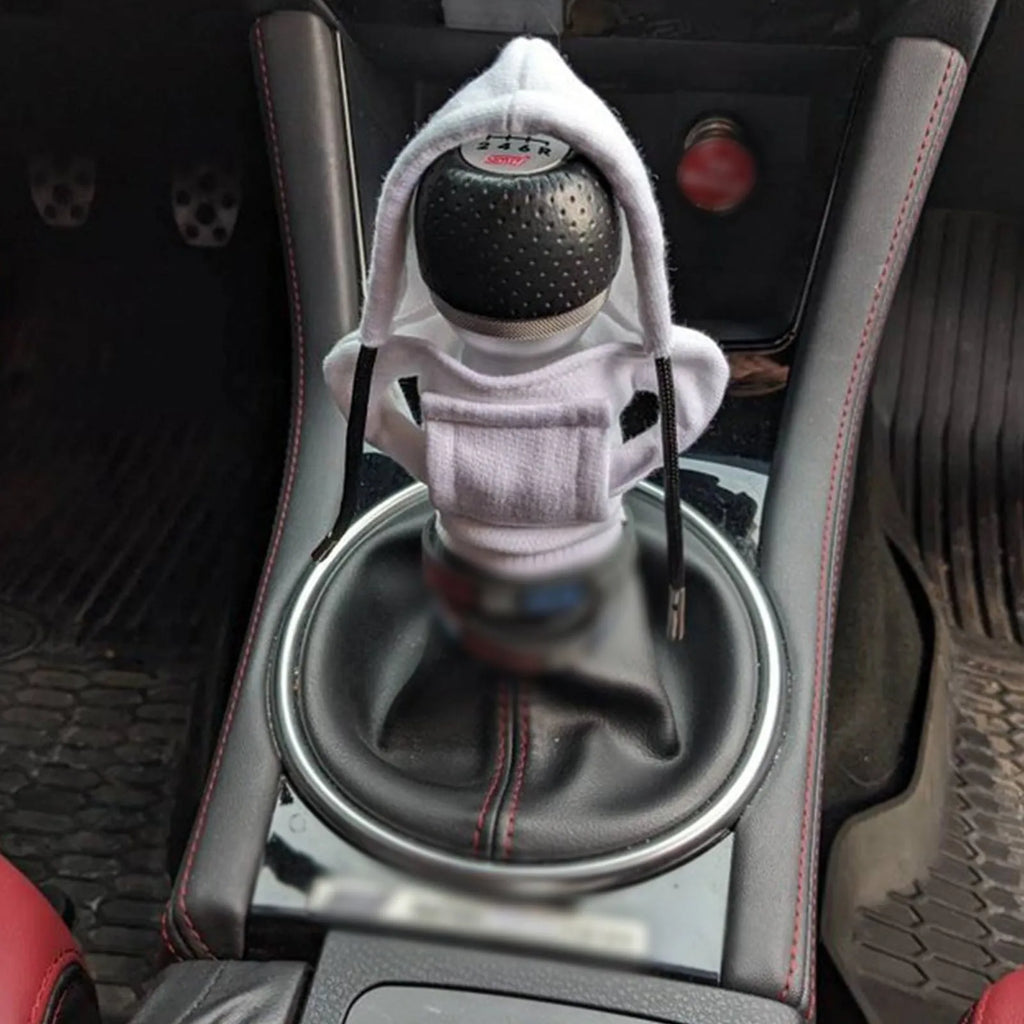 Universal 12cm pure cotton gear knob cover in hoodie style with adjustable drawcord, shown in black