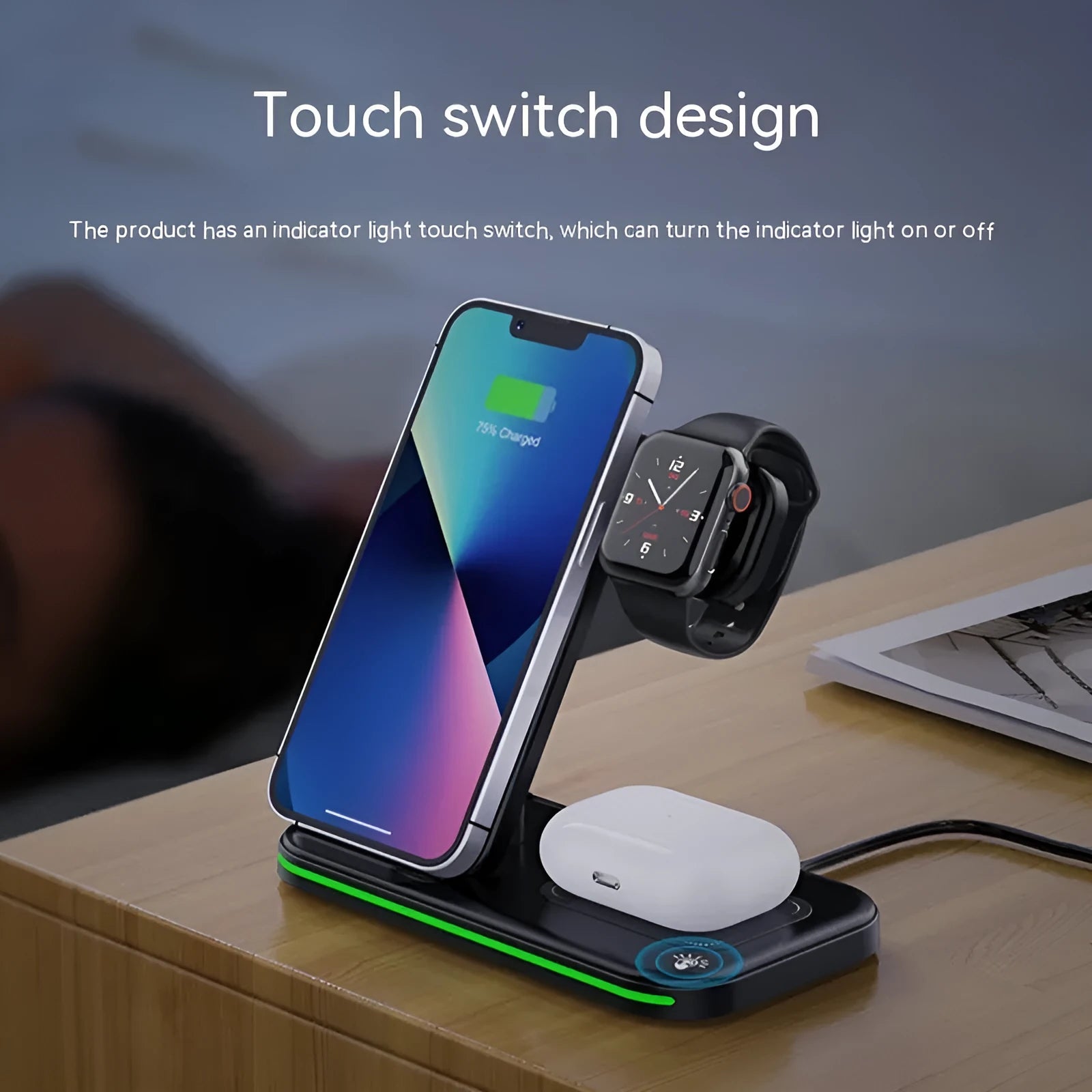 Wireless foldable fast charger in black charging a phone, headset, and watch on a desk