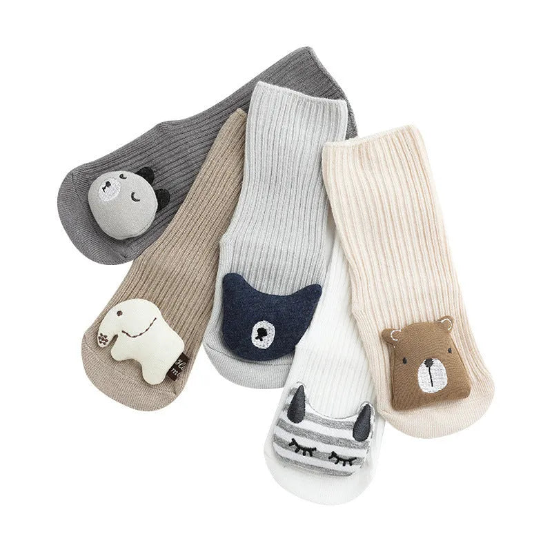 Children's combed cotton non-slip socks in multiple colours for sizes XS, S, and M.