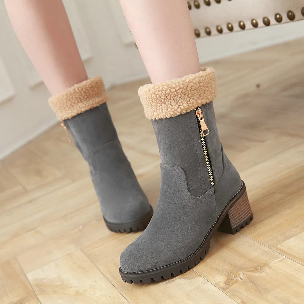 Pair of unisex winter snow boots with a rubber sole and plush lining in one of four available colours.
