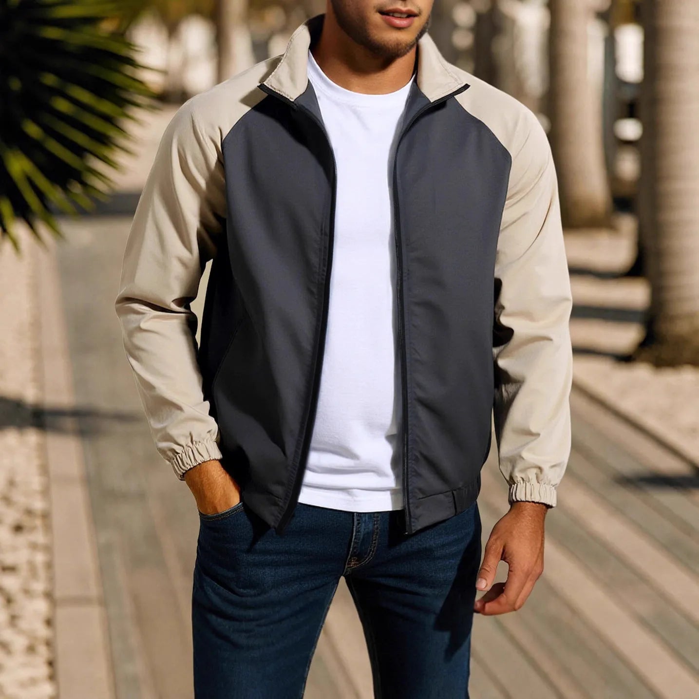 Men's green casual coat jacket with a stand collar and raglan sleeves on a hanger