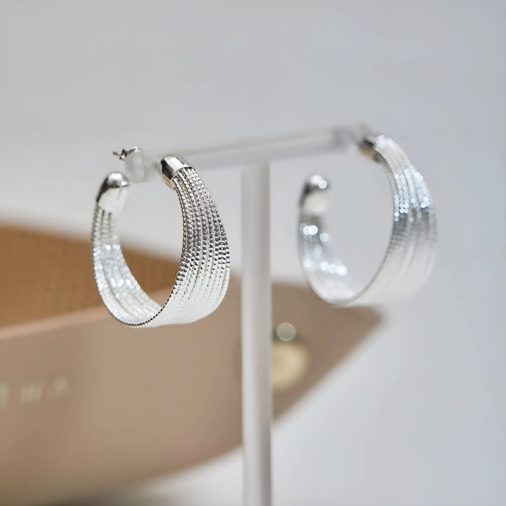 Geometric multi-layer copper earrings with stud and clip options in silver and gold finishes