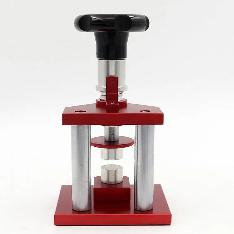 Watch repair spiral cap presser tool with a set of twenty plastic moulds for watch back covers.