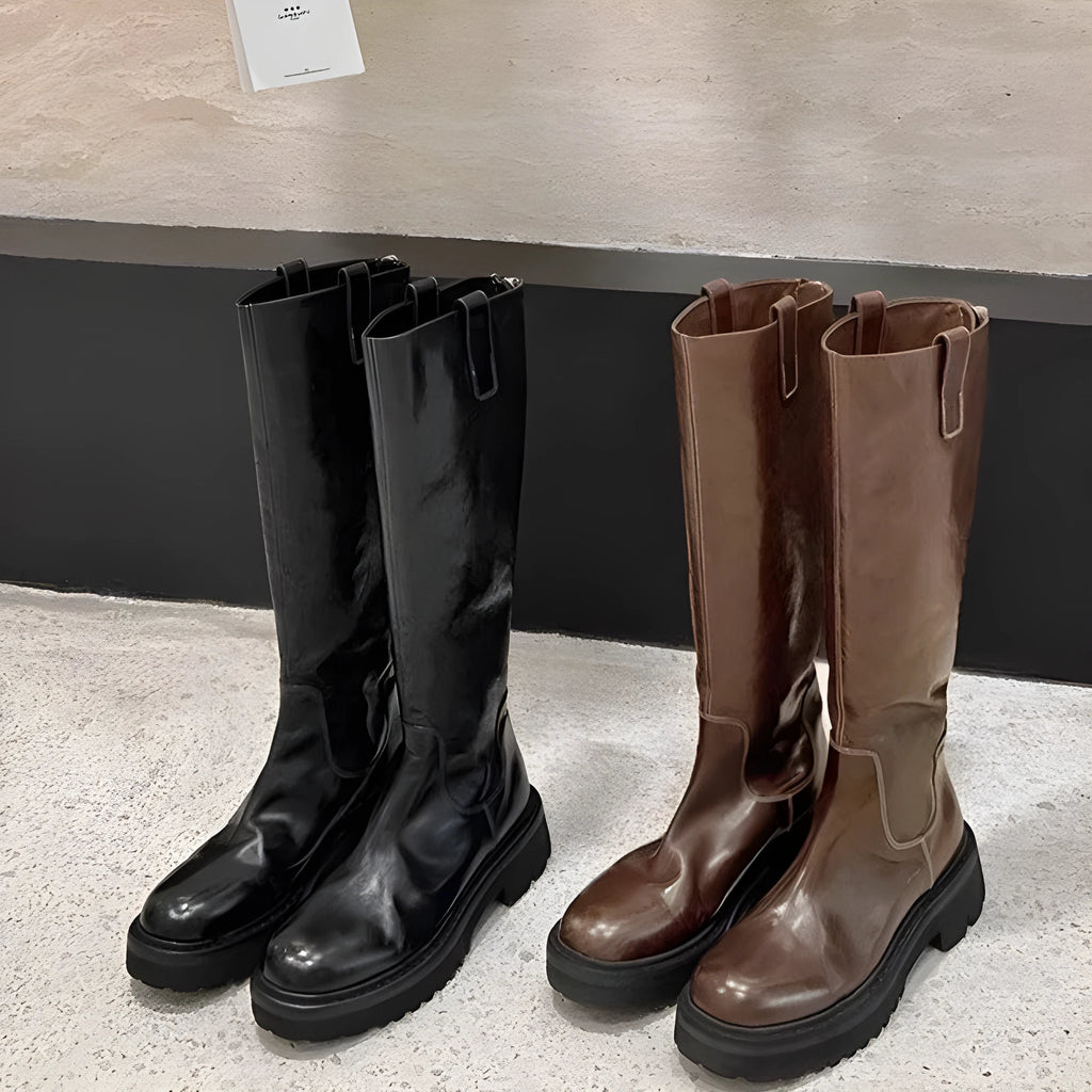 Women's black chunky heel knee-high knight boots with round toe and back zipper on a white background.