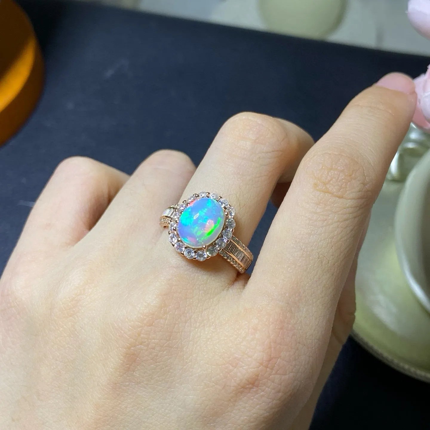 Handmade sterling silver adjustable opal ring showing rose gold, white gold, and yellow gold plated finish options.