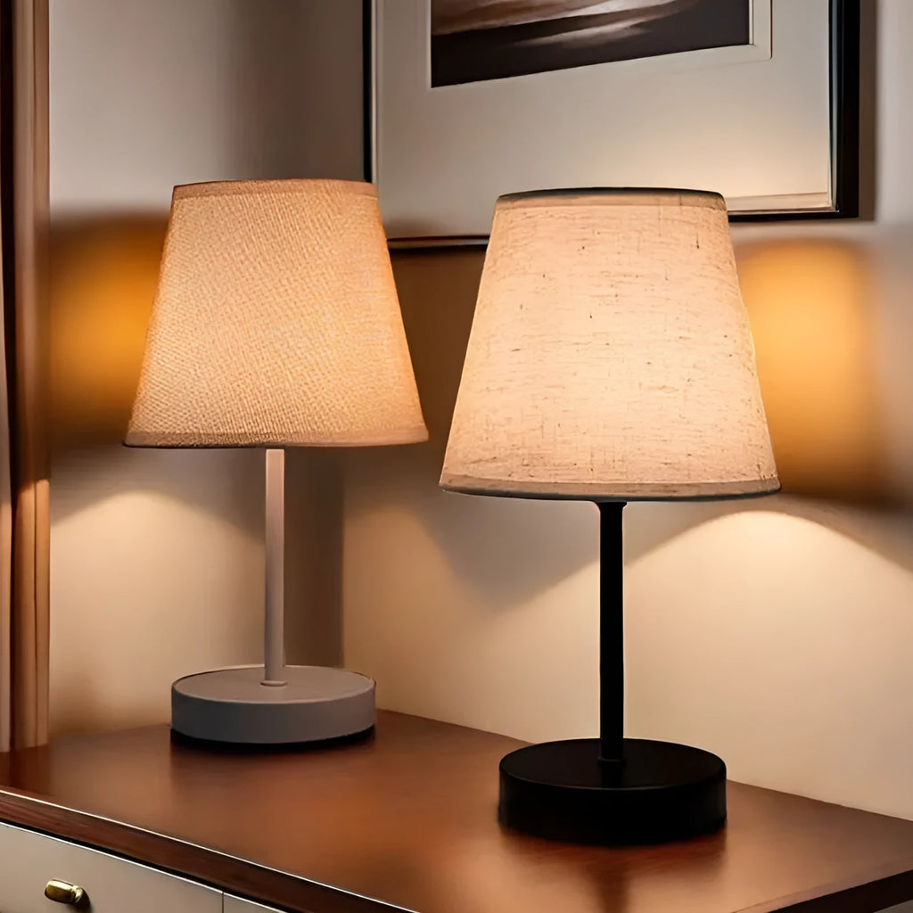 Solid wood fabric bedside lamp with rechargeable touch dimming and three colour light options on a nightstand