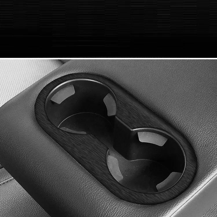 Unksera car interior modification kit with vinyl sticker sheets for dashboard, centre console, and door handles.
