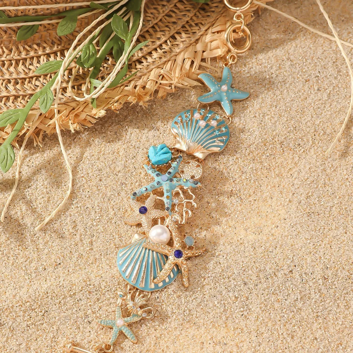 Alloy boat anchor and starfish bracelet for women in turquoise, red, or blue.