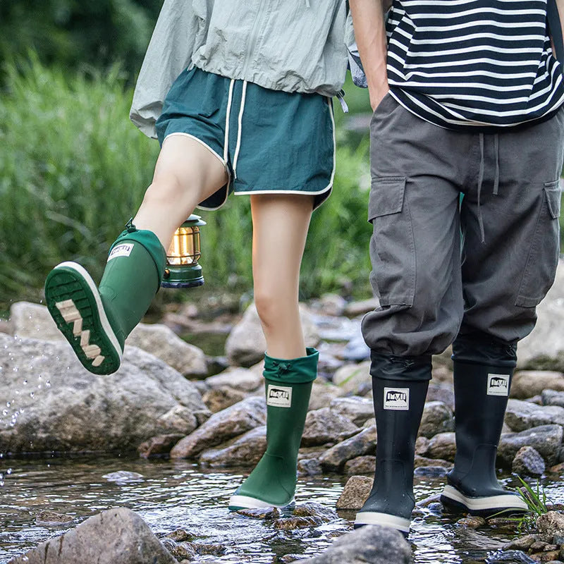 Unisex PVC platform rain boots in beige, featuring a high tube design and non-slip sole.