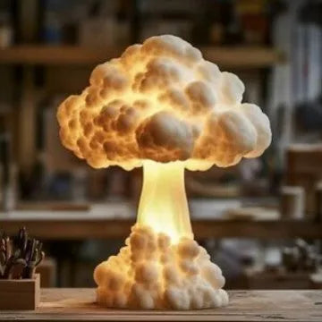 Modern art table lamp shaped like an atomic bomb mushroom cloud on a stand with USB cable.