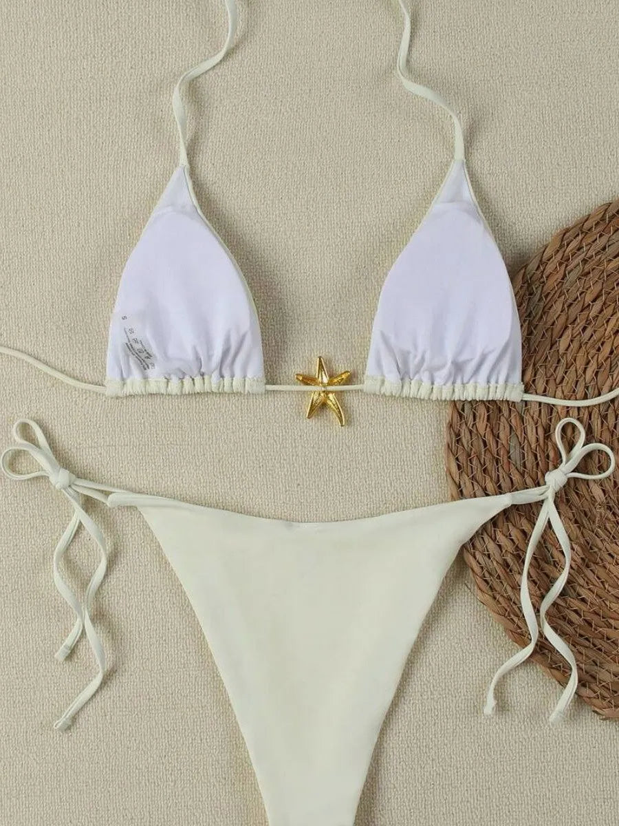 Milky white women's pure colour nylon bikini set with briefs style bottom on display