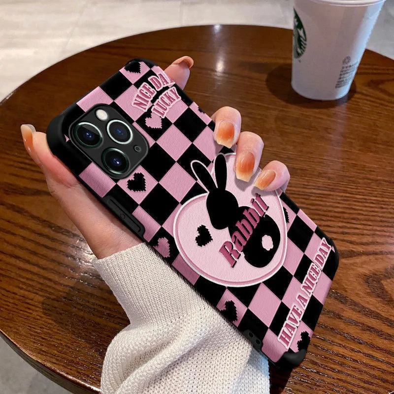 Cartoon creative TPU phone case for iPhone 11-14 Pro Max with black background and checkerboard bunny design