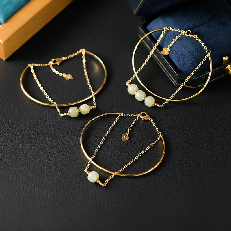 Women's jade lucky beads bracelet with gold inlay, shown in single, double, and three bead versions.