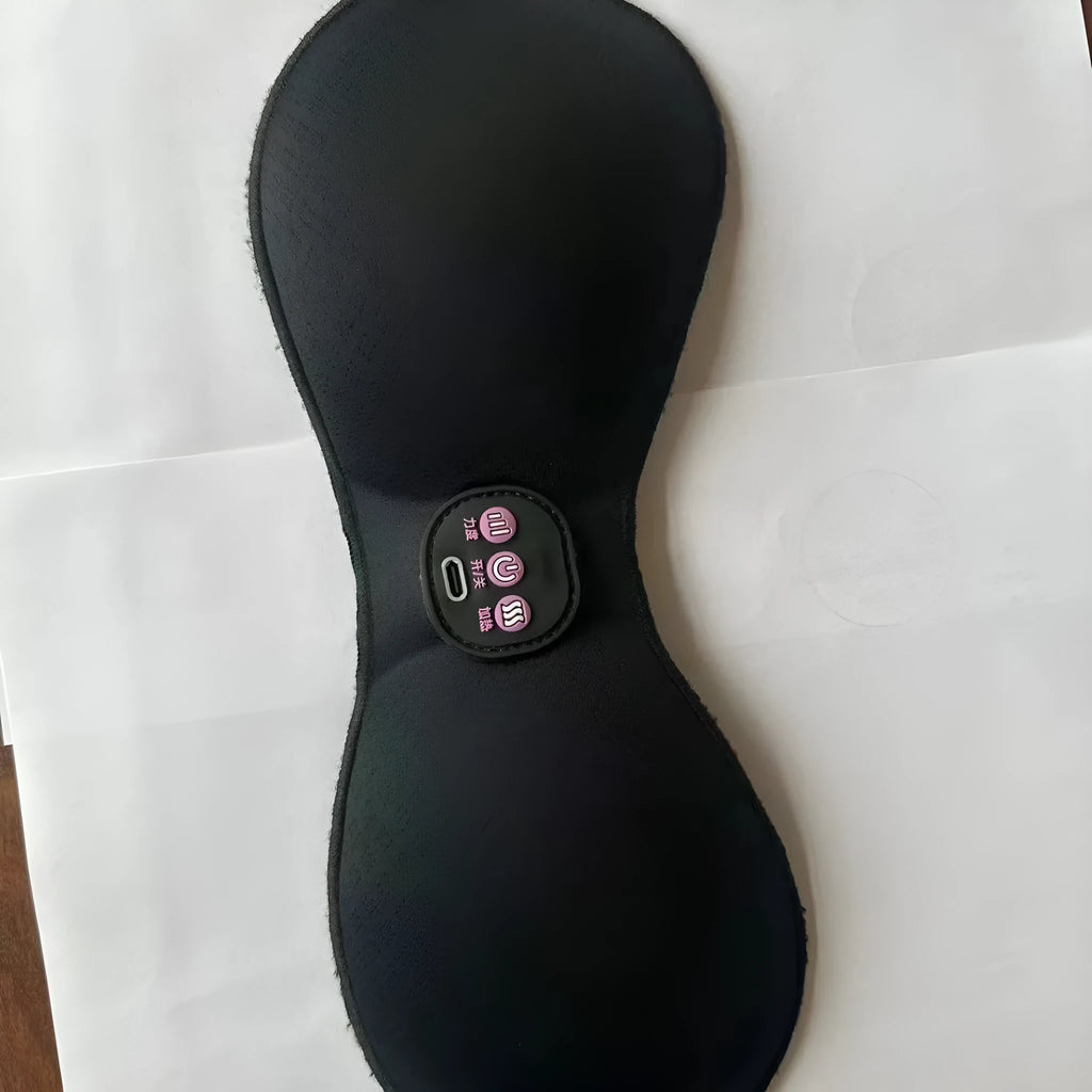 Black electric massage chest pads with adhesive stickers and three-button control panel
