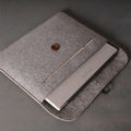 Felt laptop bag compatible with Apple MacBook, grey and orange colours, for 13-15 inch devices