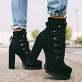 Women's suede high heel Roman ankle boots with round toe, thick heel, and buckle detail in four colours.