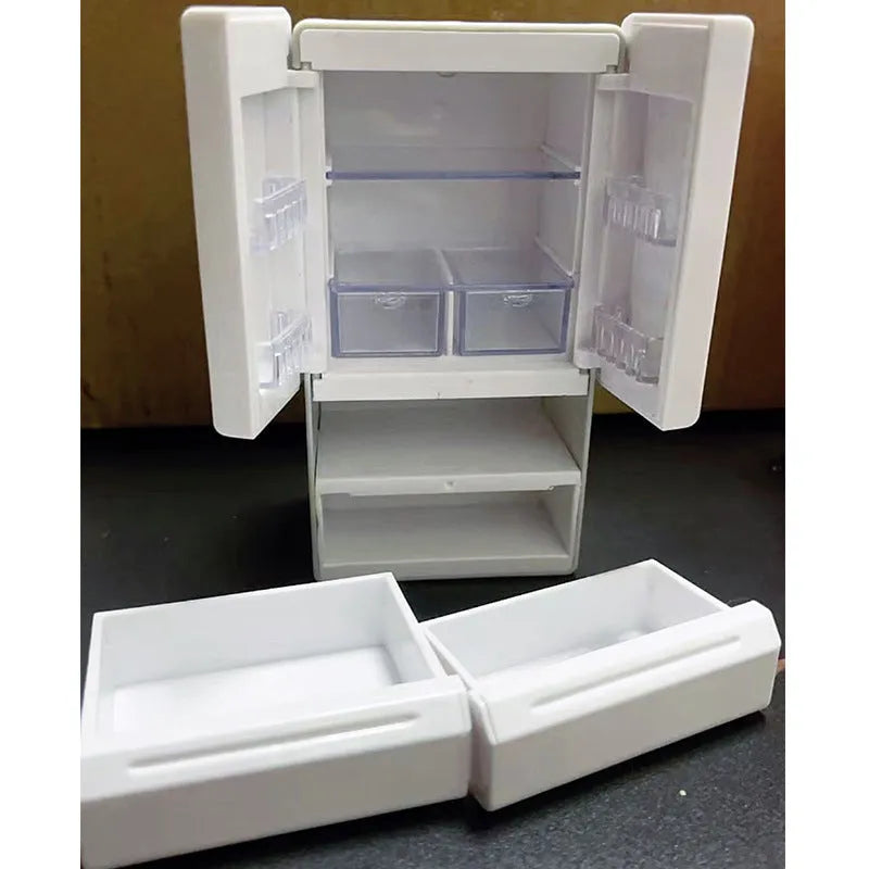 White plastic miniature candy shop model with LED light on, showing detailed front.