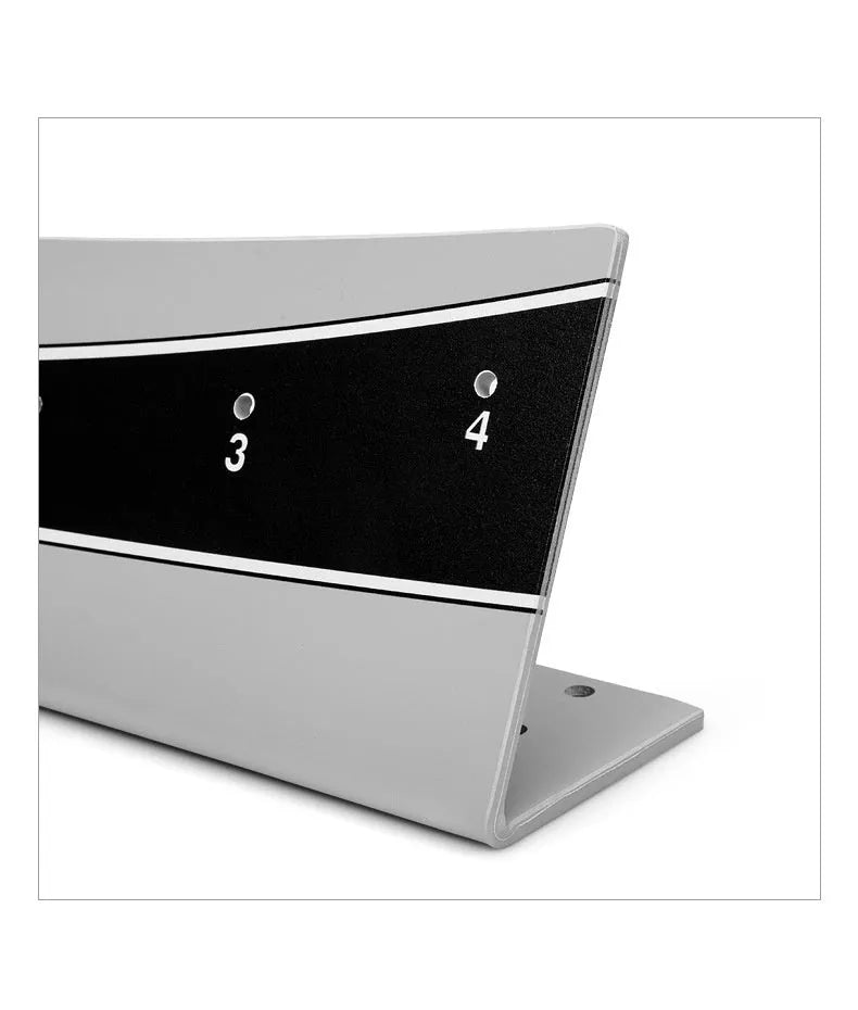 Adjustable golf putter trajectory balance simulator made from white PVC on a green mat.