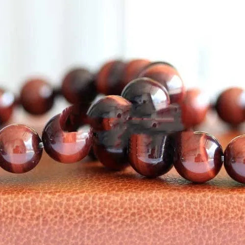 Wood alexandrite tigereye stone hand bracelet with geometric round beads in lightning cat's eye colour.