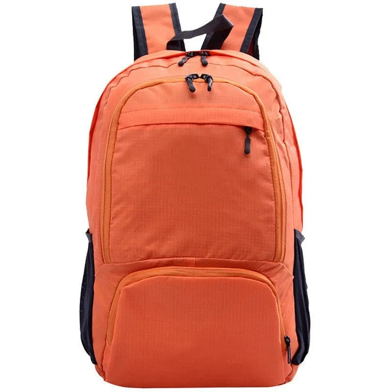 Foldable 26-inch waterproof backpack in Oxford cloth, shown in brick red colour.