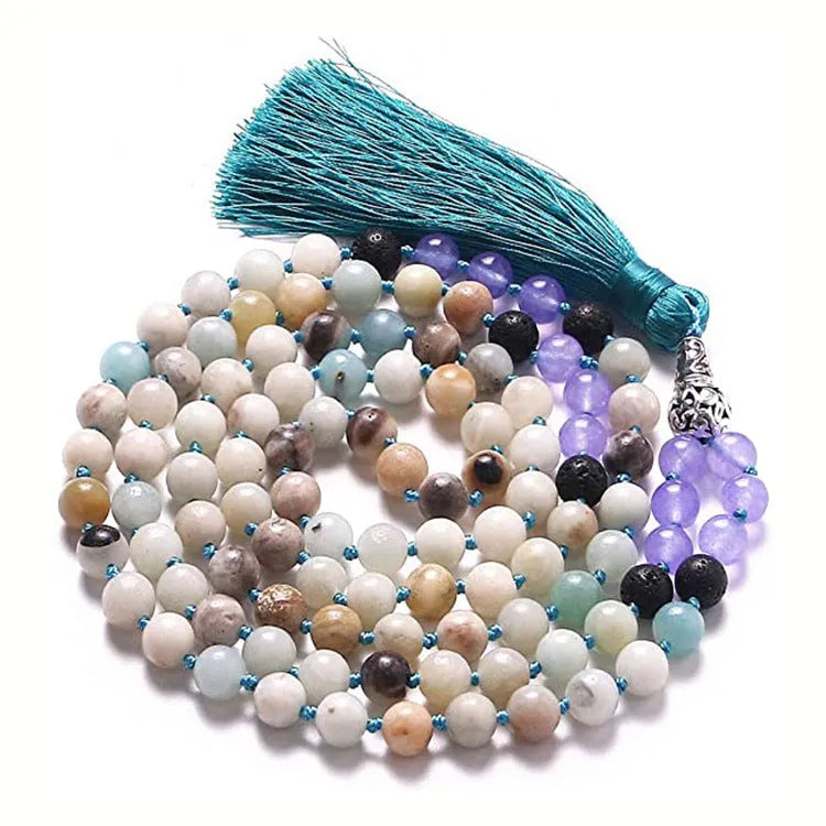 Long geometric agate and gemstone tassel necklace showing colourful beads including amethyst and lapis lazuli.