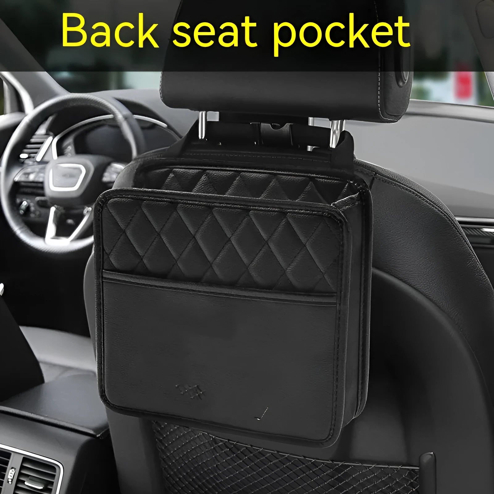Black leather hanging storage bag attached to a car seat headrest.