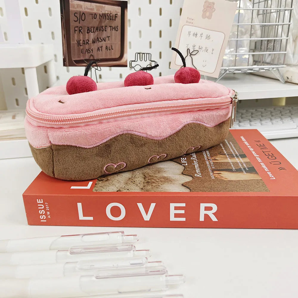 Cherry Cake design plush pencil bag made from red velvet fabric with a zip.
