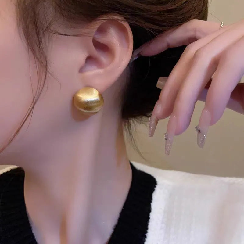 Matte brushed bean earrings for women in Gold and White colour options with a low-profile versatile design