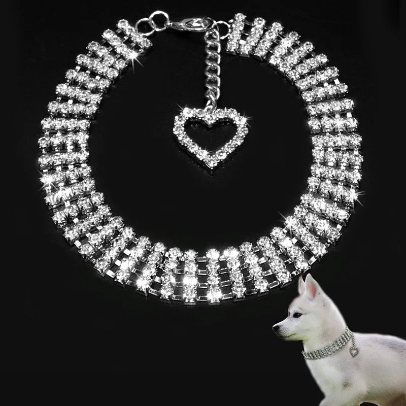 Four-row rhinestone pet collar with heart-shaped chain, silver plated, shown in white, pink, or blue