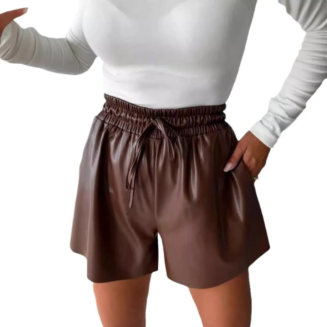 Black women's wide-leg casual shorts with a drawstring lace-up waist and PU leather trim.