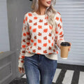 Maple leaf design Christmas sweater in beige or dark green with loose fit and round neck